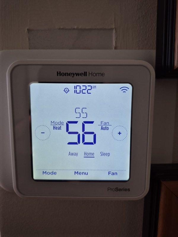 Responded to a no cool call for aging HVAC system. Discovered coupling issue on condensate drain line requiring adhesive. Unable to complete repair due to frozen glue in outdoor closet location. Scheduled return visit to glue coupling and reapply insulation over the connection. Verified thermostat operating in heat mode at 56°F.