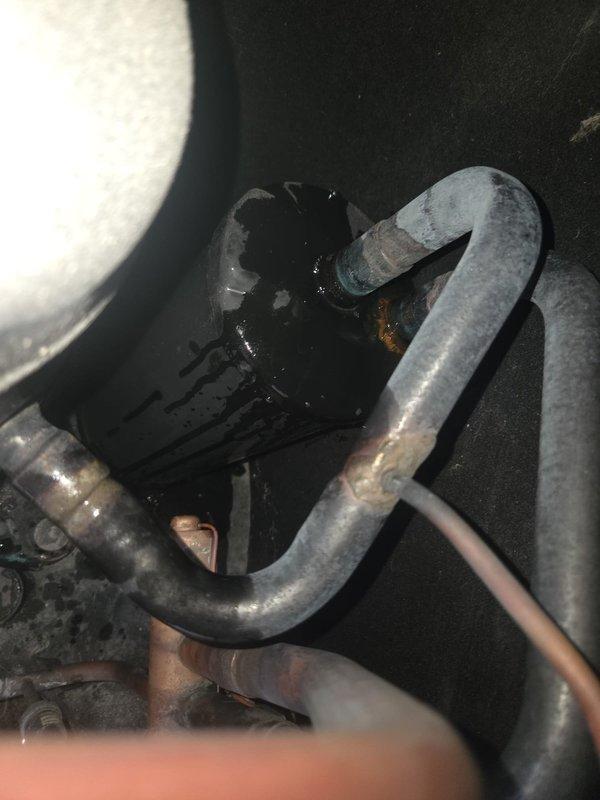 Responded to recurring compressor lockout issue on system less than 10 years old. Identified refrigerant leak at mechanical connection with visible oil residue. Verified BMWeb controller was operational with proper signal indicators illuminated, suggesting control system functioning correctly. Serviced system to restore heat functionality.