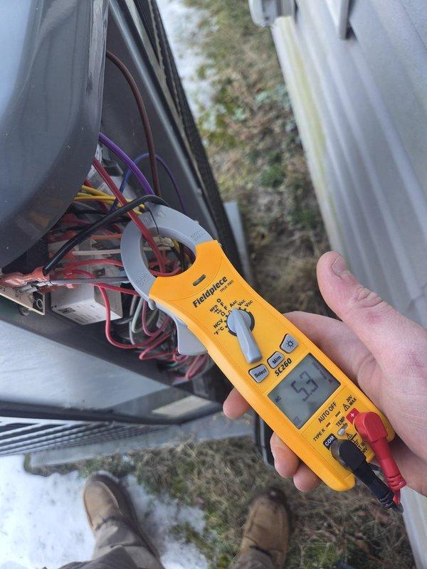 Performed routine heating maintenance for elderly tenant. Verified proper thermostat operation with room temperature at 72°F. Conducted electrical diagnostics using clamp meter, confirming system amperage at 53A, within normal operating parameters. All connections inspected and system functioning correctly.