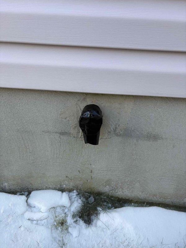 Responded to no heat call. Discovered blocked exhaust pipe on exterior wall; removed snow accumulation and replaced damaged PVC elbow fitting that was restricting proper ventilation. System restored to normal operation after clearing obstruction.