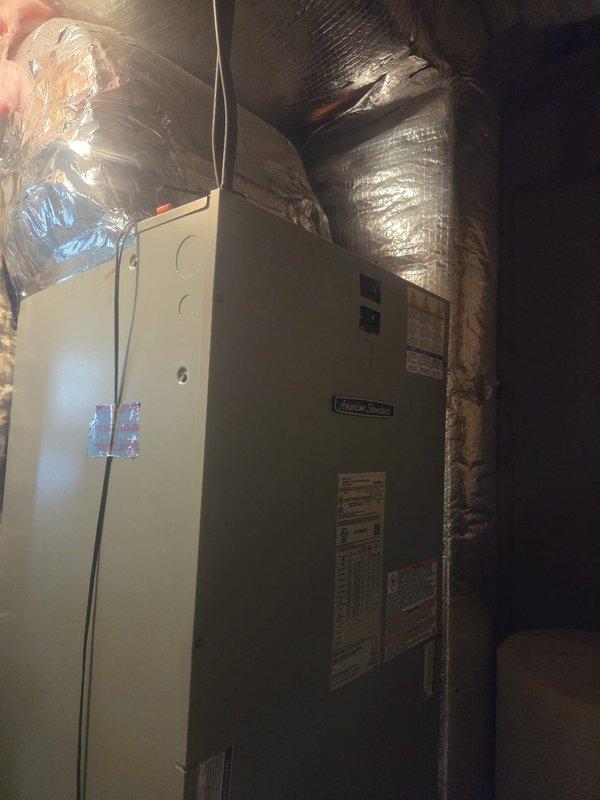 Successfully removed and replaced first floor heat pump system with new American Standard 3-ton multi-stage 17 SEER unit. Installation included adapting existing metal trunk duct with transition fittings, mounting outdoor unit on existing stand, flushing and pressure testing refrigeration lines, and installing a 15KW heater with breaker and 1" filter rack. Connected system to existing Nest thermostat and verified proper operation.