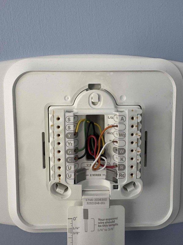 Responded to no heat call for upstairs zone. Measured 43.5°F supply air temperature with UEi instrument. Inspected thermostat wiring and found loose connection at W terminal (heat call wire). Secured connection and verified proper operation of system with heat now functioning correctly at both zones.