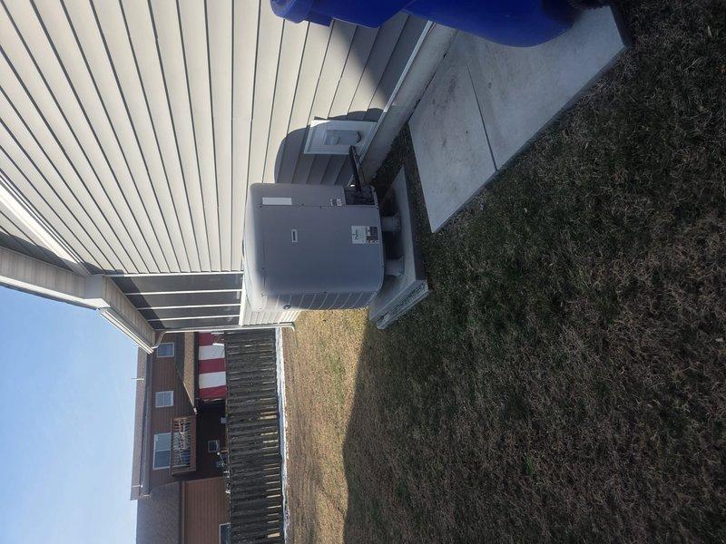 Performed routine heating maintenance service on residential HVAC system. Inspected outdoor condenser unit and verified proper operation. Examined water heater system and associated plumbing connections in utility area to ensure all components functioning correctly.