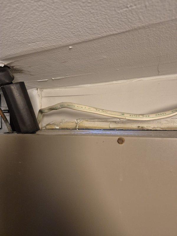 Responded to no heat call where customer reported electric bill 4x higher and fan motor continuously running. Diagnostic testing revealed system unable to reach set temperature (55°F reading with 53°F actual) with maximum heat output of 63°F. Conducted electrical testing with Fieldpiece meter showing 140.7V reading at component connection. Inspected PVC venting system and electrical connections. Resolved continuous fan operation issue and corrected heating performance problem. Customer was informed of completed repairs.