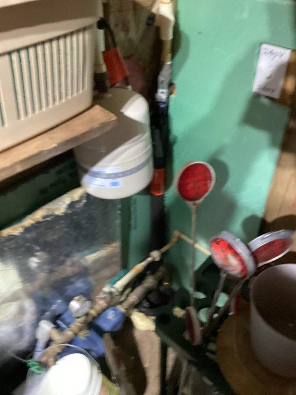 Responded to frozen pipe emergency with no water service. Inspected utility area plumbing system including valves and pipe connections. Also examined exterior deck structural elements where pipe freezing likely occurred. Successfully restored water service by thawing affected pipes and ensuring proper system operation.