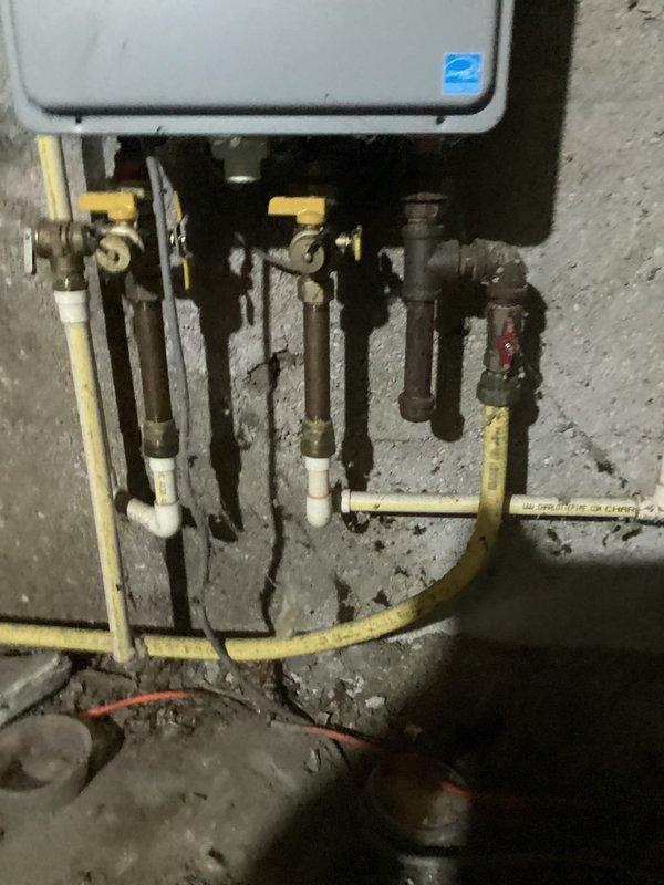 Responded to service call for Rheem tankless water heater with reported leak and no hot water. Upon inspection, found issue with gas supply and water connections. Repaired faulty connection, verified proper operation of unit, and confirmed restoration of hot water service with no leaks present.
