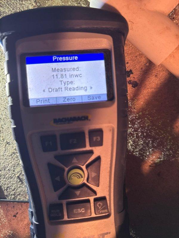 Responded to service call for zone system temperature regulation issues. Performed combustion analysis with Bacharach analyzer confirming proper operation with 98.7% efficiency at 7.7% CO2. Conducted draft pressure testing with Fieldpiece gauge measuring 11.81 inwc, verifying adequate venting. System is now maintaining proper zone temperatures.