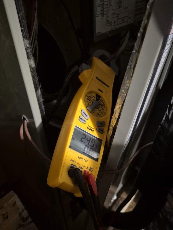 Performed comprehensive electrical diagnostics on heating system using Fieldpiece SC640 meter. Confirmed proper voltage readings of 240V at main power supply and measured operating amperage of 6.32A with 0.3 power factor. All electrical parameters within manufacturer specifications; system operating normally after inspection.