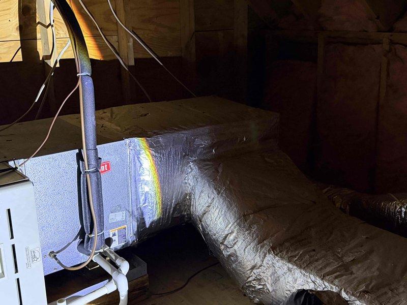 Conducted a comprehensive evaluation of a dual fuel system replacement for the upstairs HVAC unit located in the attic. Documented existing setup including air handler with insulated ductwork and assessed compatibility requirements for potential new installation. Provided information about Energize Delaware program options for energy-efficient replacement solutions.