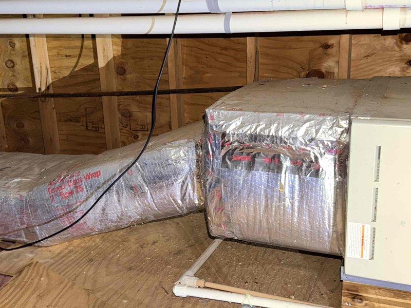 Conducted a comprehensive evaluation of a dual fuel system replacement for the upstairs HVAC unit located in the attic. Documented existing setup including air handler with insulated ductwork and assessed compatibility requirements for potential new installation. Provided information about Energize Delaware program options for energy-efficient replacement solutions.