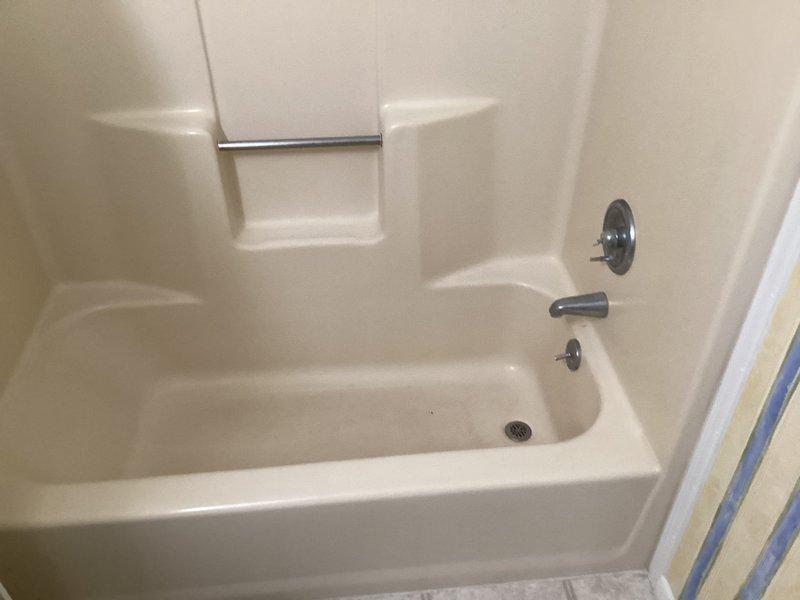 Completed initial phase of a two-visit bathroom renovation project, focusing on plumbing rough-ins. Extended water supply lines for vanities and toilets in master and hall bathrooms. Installed brushed nickel adjustable shower drain for new ceramic tile base in master bathroom. Documented existing conditions and identified requirements for second visit, which will include fixture installation and system testing.