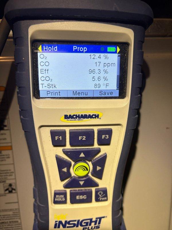 Performed scheduled heating maintenance on two systems. Conducted combustion analysis on primary system with readings showing 96.3% efficiency, 12.4% O2, 17ppm CO, and 5.6% CO2 at 89°F stack temperature. Second system (heat pump) was found with significant frost buildup on outdoor unit, indicating potential refrigerant or defrost cycle issues.