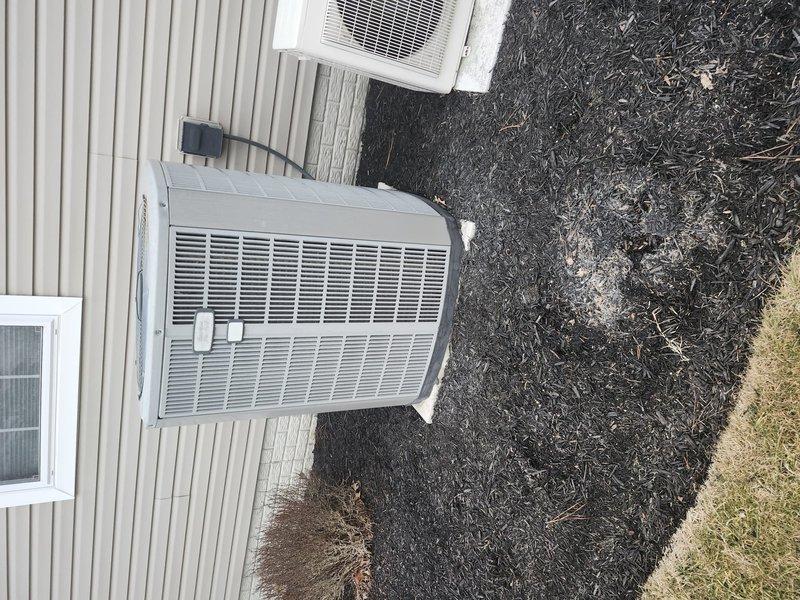 Diagnosed system failure on split HVAC system with no heat complaint. Inspection revealed condensate drain line blockage causing safety switch activation. Cleared obstruction, verified proper drainage through Charlotte PVC piping, and confirmed system operation restored with normal heating cycle.