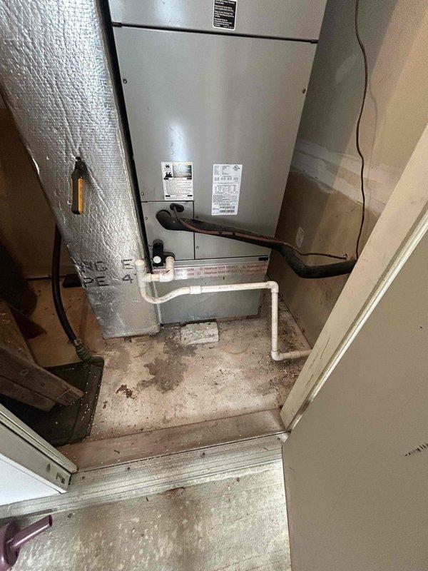 Performed scheduled heating maintenance visit on two HVAC systems. Conducted dimensional measurements for equipment clearances and inspected furnace unit in utility closet. Visual inspection revealed no immediate concerns with the installed system components and connected PVC/copper piping.