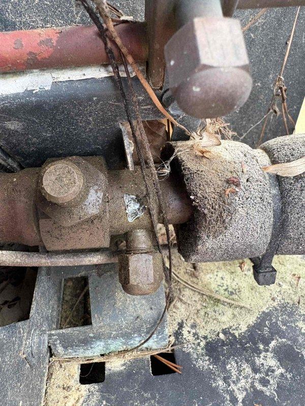 Responded to no heat call for aging HVAC system (10+ years old). Inspection revealed severely dust-contaminated components and significant corrosion on mechanical connections. Unit housed in poorly ventilated outdoor enclosure with accumulated debris and inadequate maintenance, contributing to system failure.