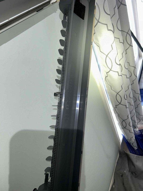 Replaced deteriorated corrugated condensate drain line on mini-split system that was causing water to discharge onto porch. Installed approximately 15 feet of new drain line and properly rerouted discharge into gutter to prevent future water damage. System will remain inactive until Spring as it is an A/C only unit.