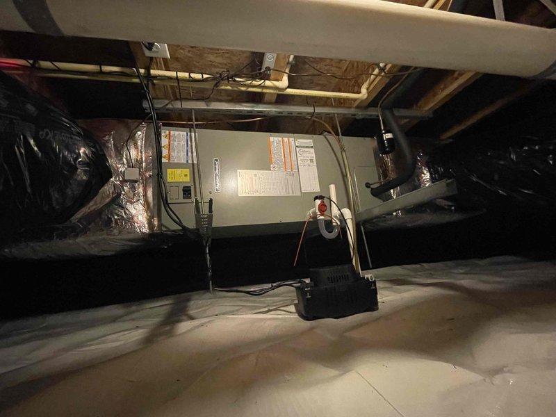 Successfully completed full HVAC system replacement, installing a 2.5-ton 14 SEER heat pump (5A6H4030) with variable speed fan coil unit (5TEM6B03) and 5kW auxiliary heater with breaker. Work included removing old equipment, adapting existing ductwork with transition fittings, mounting outdoor unit on platform, installing electrical connections, and properly flushing and testing refrigerant lines while utilizing the existing thermostat and damper system.