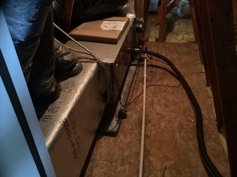 Performed site assessment for potential system replacement of existing Coleman outdoor unit and indoor furnace. Customer is interested in upgrading to a Carrier inverter system. Current installation includes an aging Coleman condensing unit on concrete pad with visible weathering, alongside a standard efficiency furnace with conventional ductwork in utility space. Installation timeline targeted for early April.