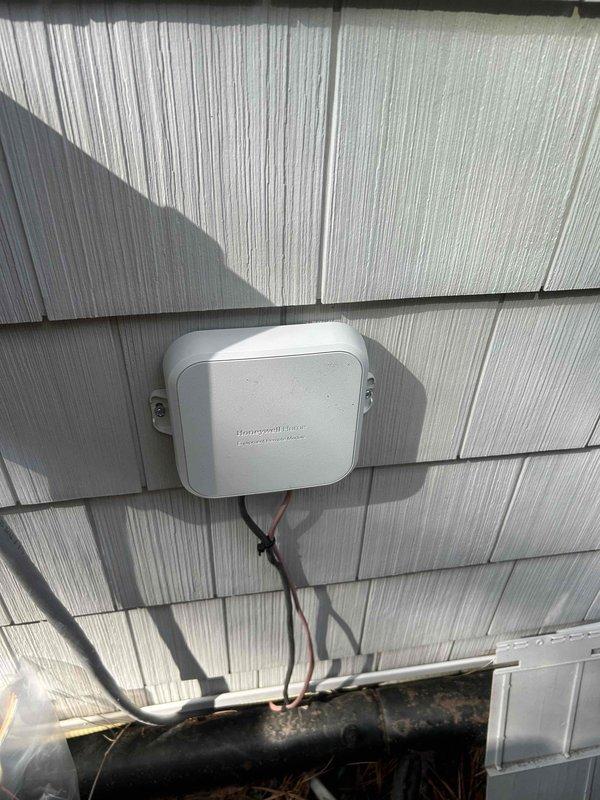 Successfully installed a Honeywell RedLINK wireless module and compatible thermostat to resolve System #2's emergency heat condition. Addressed the thermostat wire splice issue to outdoor unit where only 4 wires were functional, restoring proper system operation as confirmed by temperature testing.