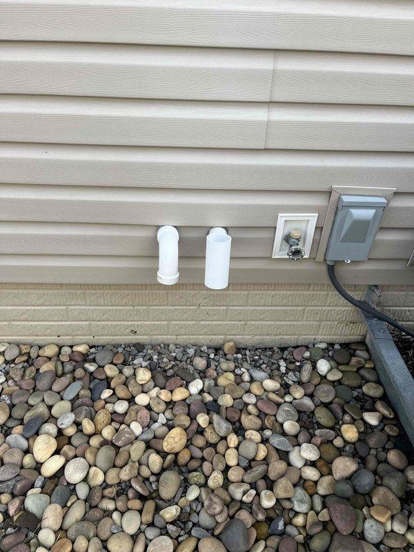 Responded to a no heat call for a furnace located in the crawl space. Diagnosed and repaired the heating system, returning it to proper operation. Exterior inspection of the property and HVAC equipment was conducted, including documentation of the outdoor condensing unit and associated drainage components.