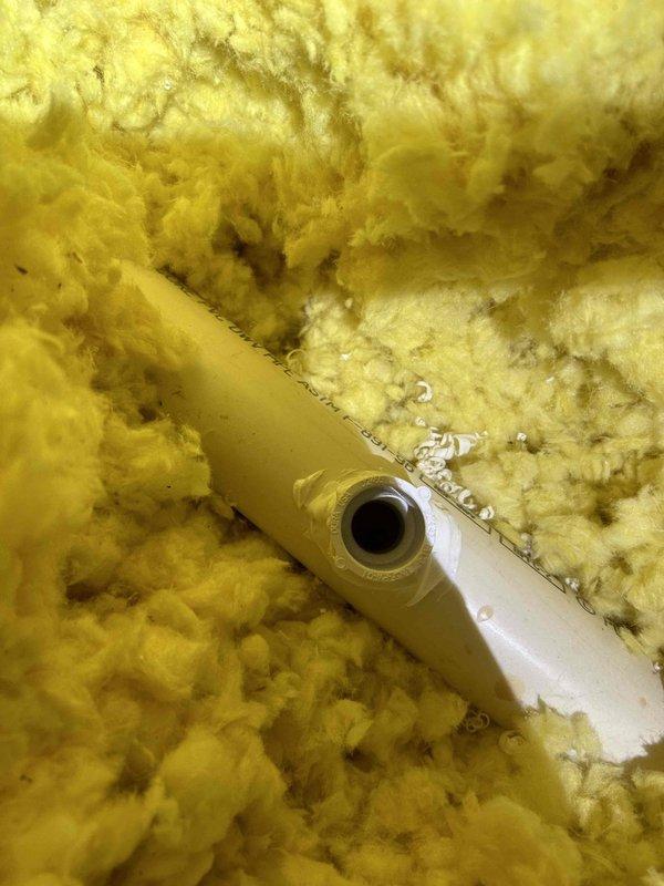 Diagnosed frozen condensate drain line in attic of American Standard furnace (Model S9V2B080U4PSBD). Set heat pump lockout to 20 degrees to maintain heating while awaiting parts. Ordered new condensate assembly drain line and PVC pipe to reroute drain to plumbing vent pipe, which will create a shorter run to prevent future freezing issues.