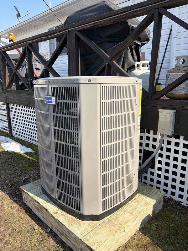 Successfully replaced existing HVAC system with a new American Standard 3-ton 17 SEER heat pump (5A6H7036) and variable speed fan coil unit (5TEM6D04) with 15KW auxiliary heat package. Installation included complete removal of old equipment, mounting the outdoor unit on pressure-treated wood platform, installing the indoor unit with proper drainage, reconnecting to existing EccoBee thermostat, and full system commissioning with refrigerant line flushing, pressure testing, and charging.