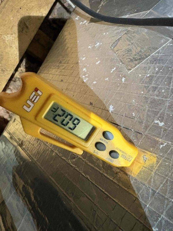 Diagnosed voltage supply issue to aging heating system, confirming 209V at power source. Inspected and repaired deteriorated electrical connections at junction box, including replacement of damaged wiring and terminal connections to restore proper system operation.