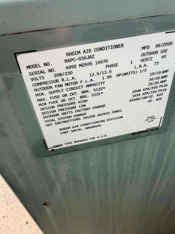 Conducted assessment of two HVAC systems requiring replacement. Original Rheem unit (model RAPC-036JAZ) installed in 2005 showing age-related wear. Systems serve separate zones (1st/2nd floors and 3rd/4th floors) with controlled damper systems and individual thermostats per floor. Current PROTECH Model 500 digital thermostat maintains functionality but would be upgraded with system replacement.