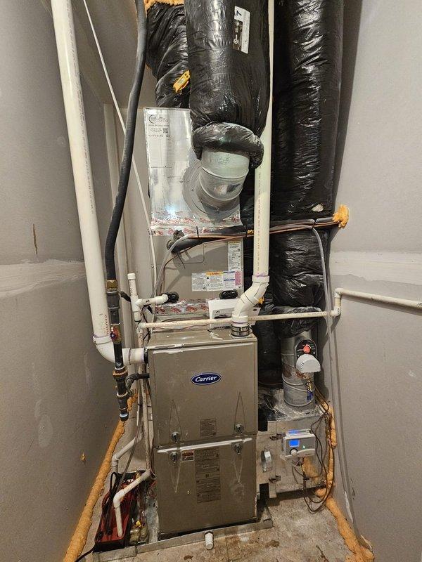 Performed comprehensive inspection of Carrier HVAC system for pre-sale evaluation, including furnace in utility room and outdoor condenser unit. System appears properly installed with appropriate connections, ductwork sealing, and drainage components. Documentation provided with detailed photos for buyer's reference.