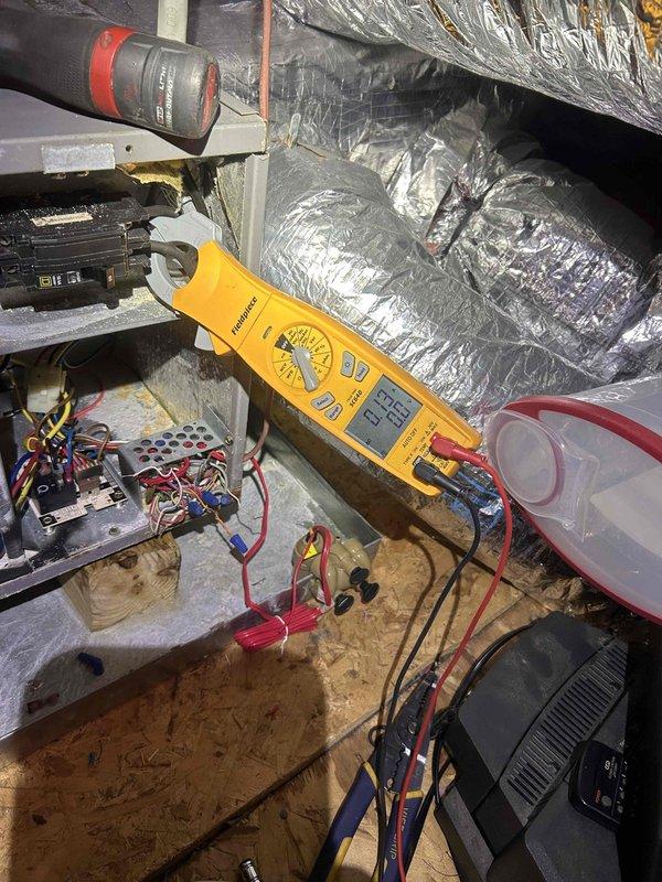 Responded to emergency call for a heating system that continuously ran and wouldn't shut off when reaching set temperature, automatically switching to emergency heat mode. Diagnostic testing with multimeter identified faulty circuit board with defective fan relay. Replaced control module/relay board (part #A0063717) to restore proper thermostat communication and heating cycle operation.