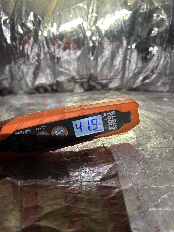 Performed scheduled cooling maintenance on two HVAC systems. Temperature differential measurements were taken using Klein Tools digital thermometer, with readings of 41.9°F at supply and 60.8°F at return, confirming proper system operation within manufacturer specifications.