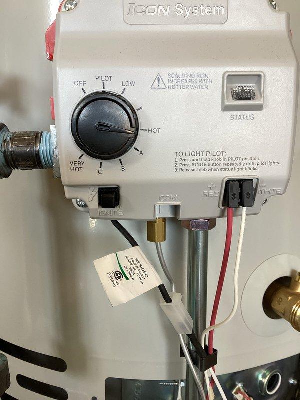 Responded to emergency water leak from recently installed water heater. Discovered water pooling on garage floor from the Icon System unit mounted on wooden platform. Inspected control panel, connections, and temperature settings; resolved leak by properly securing fittings and ensuring proper operation of the backflow prevention system.