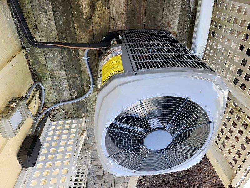 Completed installation of a complete American Standard HVAC system, including a 2.5-ton 14 SEER heat pump, air handler, 10kw electric heat kit, and digital WiFi thermostat. Removed and disposed of old equipment, installed metal duct transitions, reused existing utilities where appropriate, replaced outdoor disconnect and electrical whip, and positioned outdoor unit on existing stand. System was properly mounted on wooden deck platform with all necessary electrical conduits and refrigerant lines connected according to manufacturer specifications.