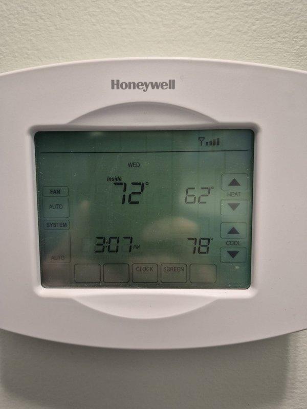 Performed scheduled cooling system maintenance service using customer-provided key for access. Conducted electrical system inspection with clamp meter, recording amperage readings of 3.42. Verified proper operation of Honeywell digital thermostat and confirmed temperature setpoints (62° heat, 78° cool) with system in auto fan mode.