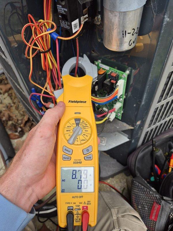 Performed scheduled cooling maintenance visit on system. Conducted electrical testing using Fieldpiece SC640 clamp meter, measuring amperage readings of 0.72A and 0.68A with voltage at 0.3V. Inspected capacitor and verified all electrical components and connections were functioning within normal parameters.