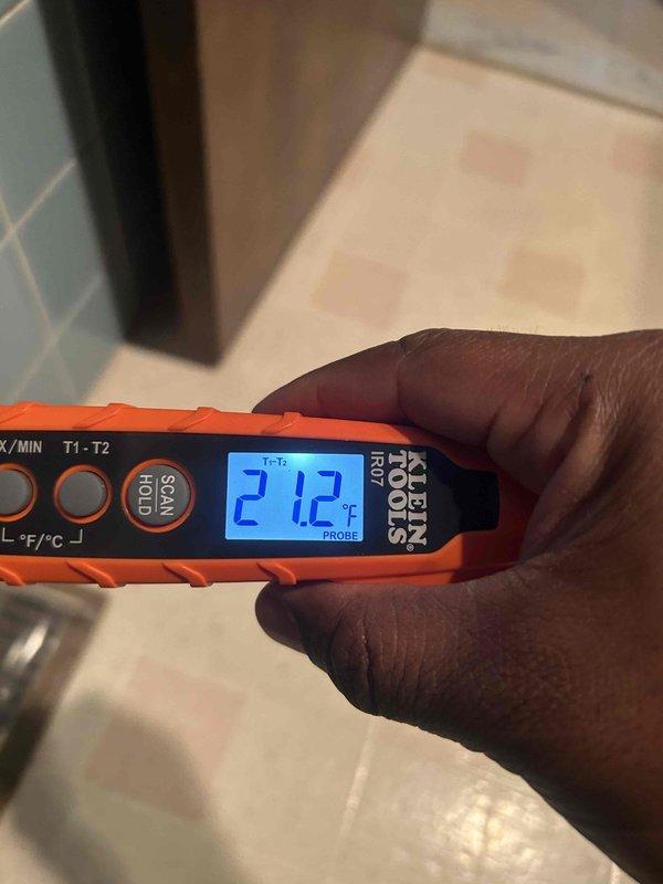 Performed routine cooling system maintenance check, verifying temperature differentials with Klein Tools IR07 thermometer. Readings showed 21.2°C supply temperature and 45.5°C at system probe point, confirming proper operation within manufacturer specifications. Customer is obtaining replacement filters to be installed at unit location.