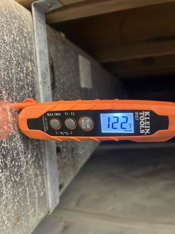 Performed diagnostic assessment on furnace system, inspecting control components and internal mechanisms. Temperature probe testing indicated elevated readings of 122°F at the supply plenum/duct, confirming proper heat exchanger operation and adequate thermal output.