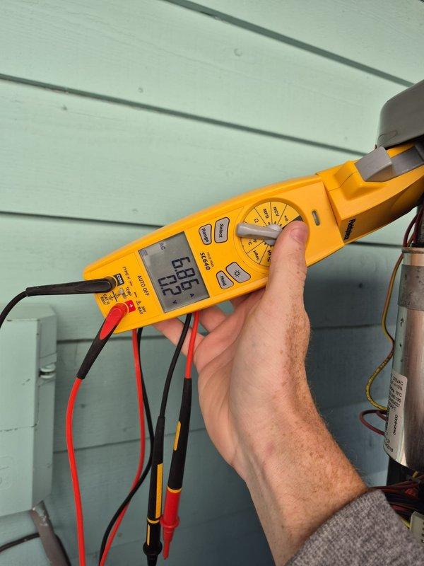 Completed cooling maintenance service on system. Performed electrical diagnostics using Fieldpiece SL640 clamp meter, recording amperage readings of 3.08A and voltage measurements of 686.4V. Inspected and tested circuit breakers in Square D electrical panel to ensure proper operation.