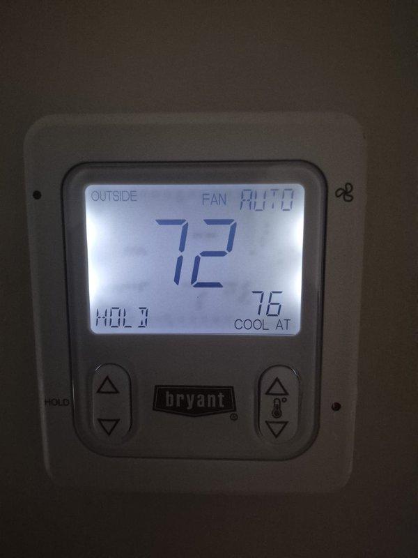 Performed scheduled cooling maintenance visit on Bryant HVAC system. Inspected thermostat functionality, confirming proper operation with heat/cool settings at 72°/76° respectively, and verified outside temperature sensor reading correctly at 72°F. System was operating in auto mode with fan functioning normally.