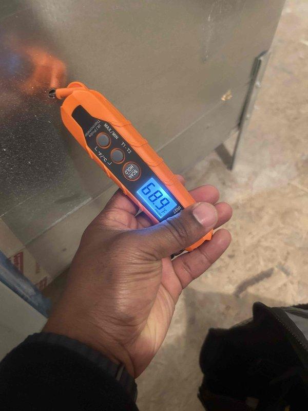 Performed comprehensive HVAC system tune-up, conducting temperature differential testing with digital thermometer. Readings showed 49.8°F at supply and 68.9°F at return, confirming system is operating within normal parameters. Inspection completed on one system as scheduled.