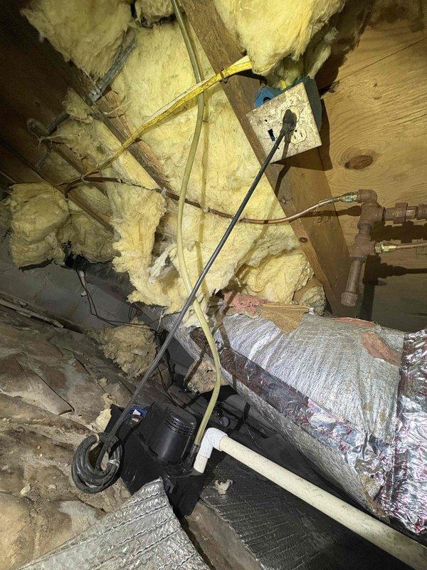 Performed comprehensive cooling maintenance visit on HVAC system located in crawl space. Inspected air handler unit mounted on platform, checked all connections including refrigerant lines, electrical components, and ductwork with foil insulation. Verified system operation with particular attention to the electrical connections in junction box and copper piping integrity.