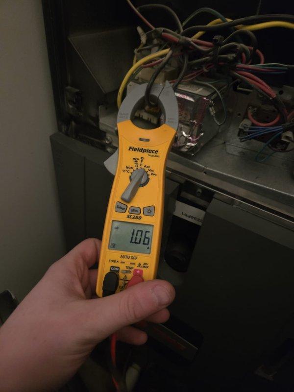 Performed priority maintenance service on two cooling systems. Inspected Trane thermostat functionality (confirmed operational at 71°F setpoint) and conducted electrical diagnostics using clamp meter, which measured 10.6 amps on the HVAC system's control circuitry. All systems operating within normal parameters after service.