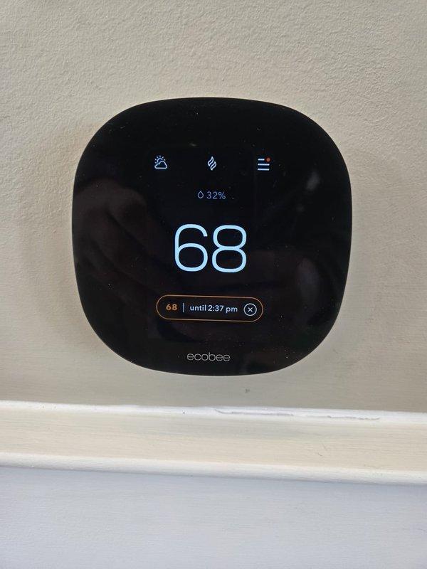 Performed cooling maintenance check on multiple systems. Verified Ecobee thermostat operation (32% battery) and measured supply air temperature at 52.5°F. Customer requested 16x25x1 filters; none were available in stock, so arranged for future delivery of a case while customer sourced temporary filters independently.