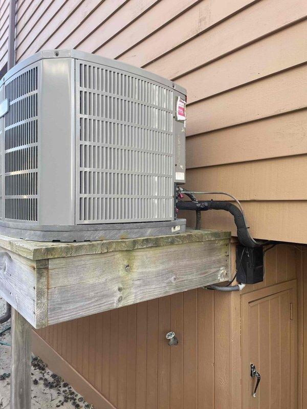 Responded to customer concern regarding continuously running compressor and high electricity bills. Performed diagnostic inspection on three HVAC cooling systems installed on elevated wooden platforms against exterior of residence. Identified and corrected system cycling issue, verified proper operation of all three condensing units, and confirmed normal compressor function. Systems now operating within normal parameters.