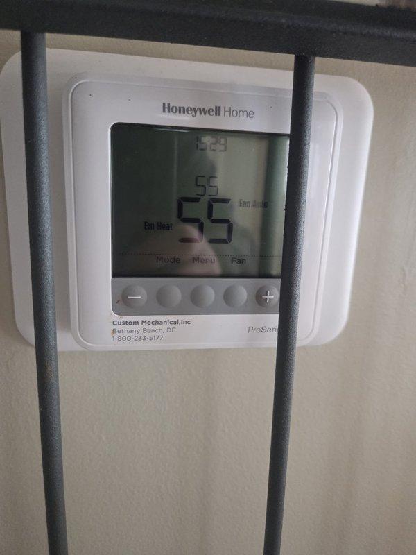 Performed scheduled cooling maintenance visit. Conducted electrical testing with Fieldpiece SC260 clamp meter, measuring electrical parameters at 1.1 reading. Verified proper operation of Honeywell Home thermostat (showing 55°, Fan Heat/Auto settings). System now functioning correctly after service completion.