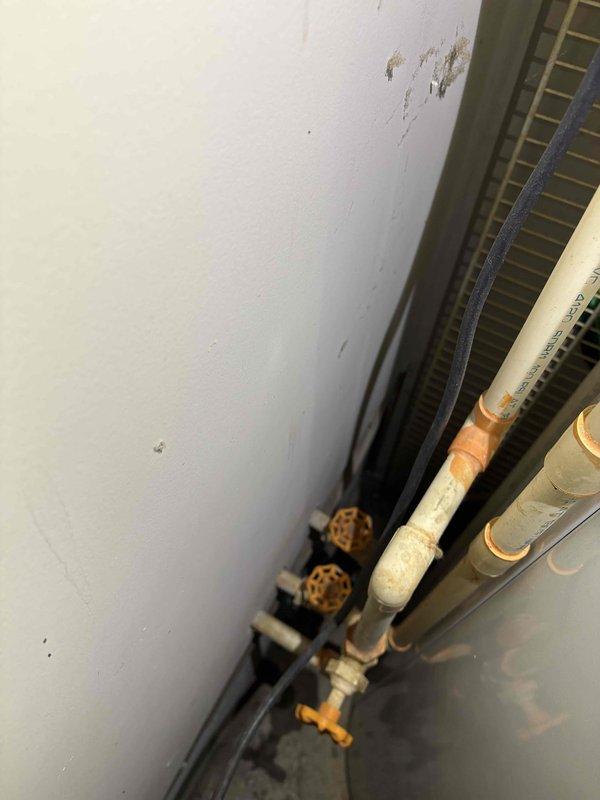 Performed routine cooling maintenance on three HVAC systems. Inspected electrical circuit breaker panel for proper operation and verified all connections were secure. Examined plumbing components including copper pipes and shutoff valves, noting some oxidation but confirming system integrity.