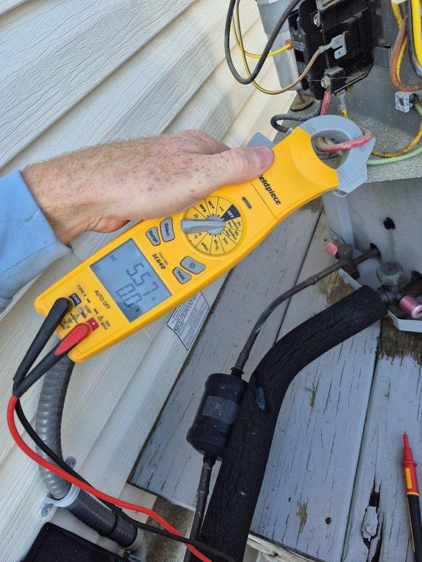 Performed routine cooling system maintenance check on residential HVAC unit for a returning customer. Verified thermostat functionality (LUX digital model) was operating properly in heat mode at 66°F. Conducted electrical diagnostics using clamp meter, confirming amperage draw of 56.9 amps on compressor, which is within acceptable parameters. System is now operating efficiently with no issues detected.