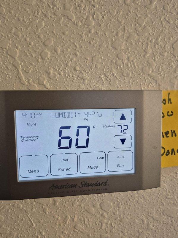 Responded to no-heat call and diagnosed system. Discovered thermostat was functioning properly with room temperature at 72°F despite customer-reported heating issue. Electrical testing of the circuit breaker panel confirmed proper voltage to the system at 40.95V. After inspection, determined the heating system was operational with no defects; customer may have experienced temporary power interruption during recent storm which reset the system.