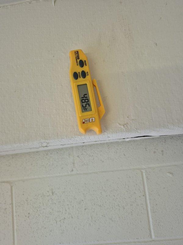 Responded to service call for non-operational air conditioning system. Performed diagnostic testing with UEi instrument which registered a high reading of 59H. Discovered faulty mounting bracket with corroded electrical connection points which was removed and replaced, restoring system functionality.