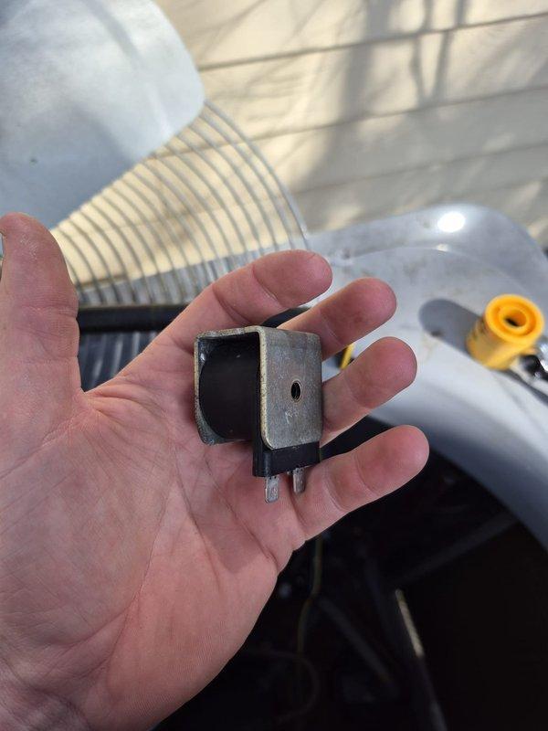Responded to service call for non-operational air conditioning system. Performed diagnostic testing with UEi instrument which registered a high reading of 59H. Discovered faulty mounting bracket with corroded electrical connection points which was removed and replaced, restoring system functionality.